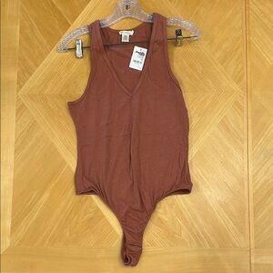 Charlotte Russe Pink Sleeveless Fitted Bodysuit